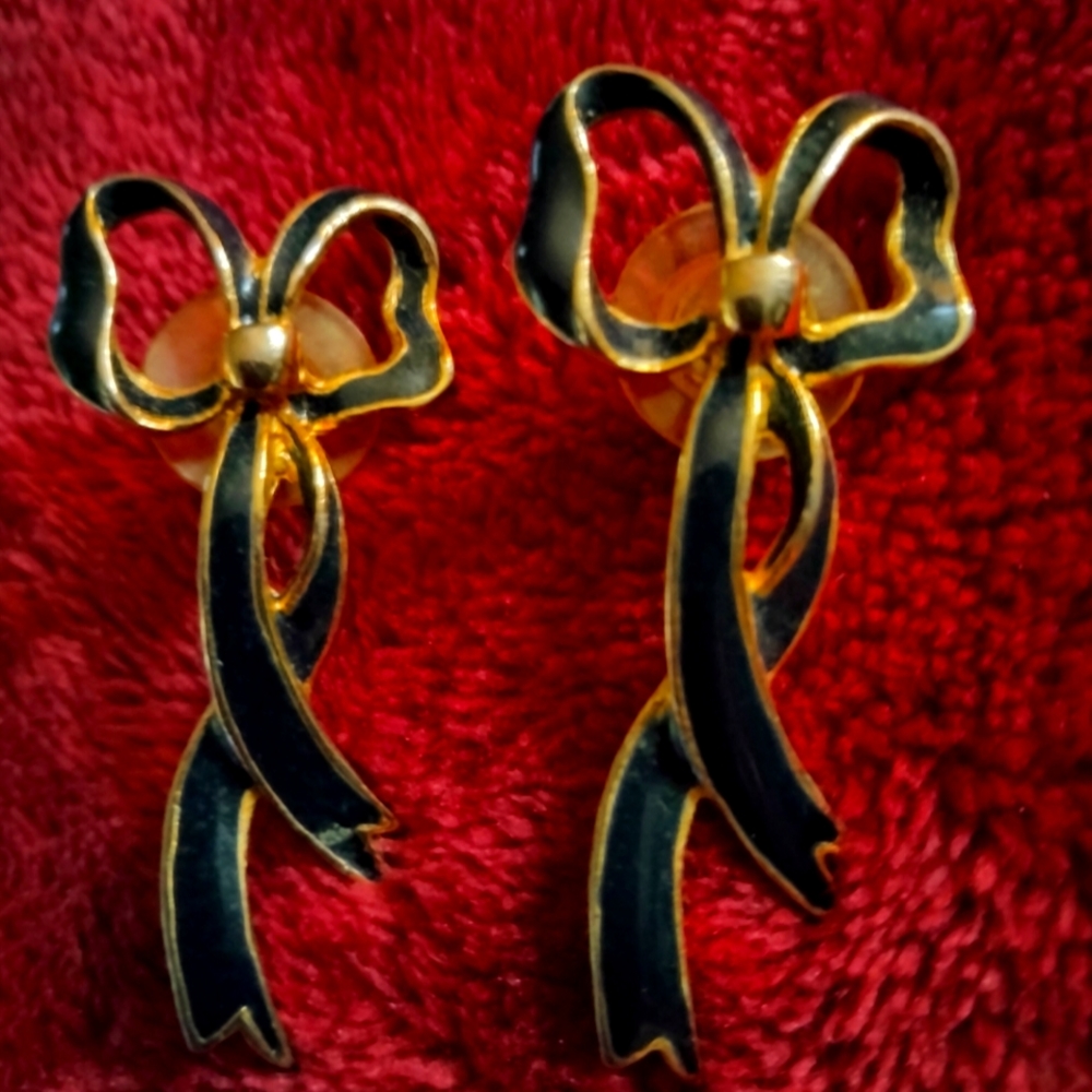 Black bowtie pierced earrings in like new condition